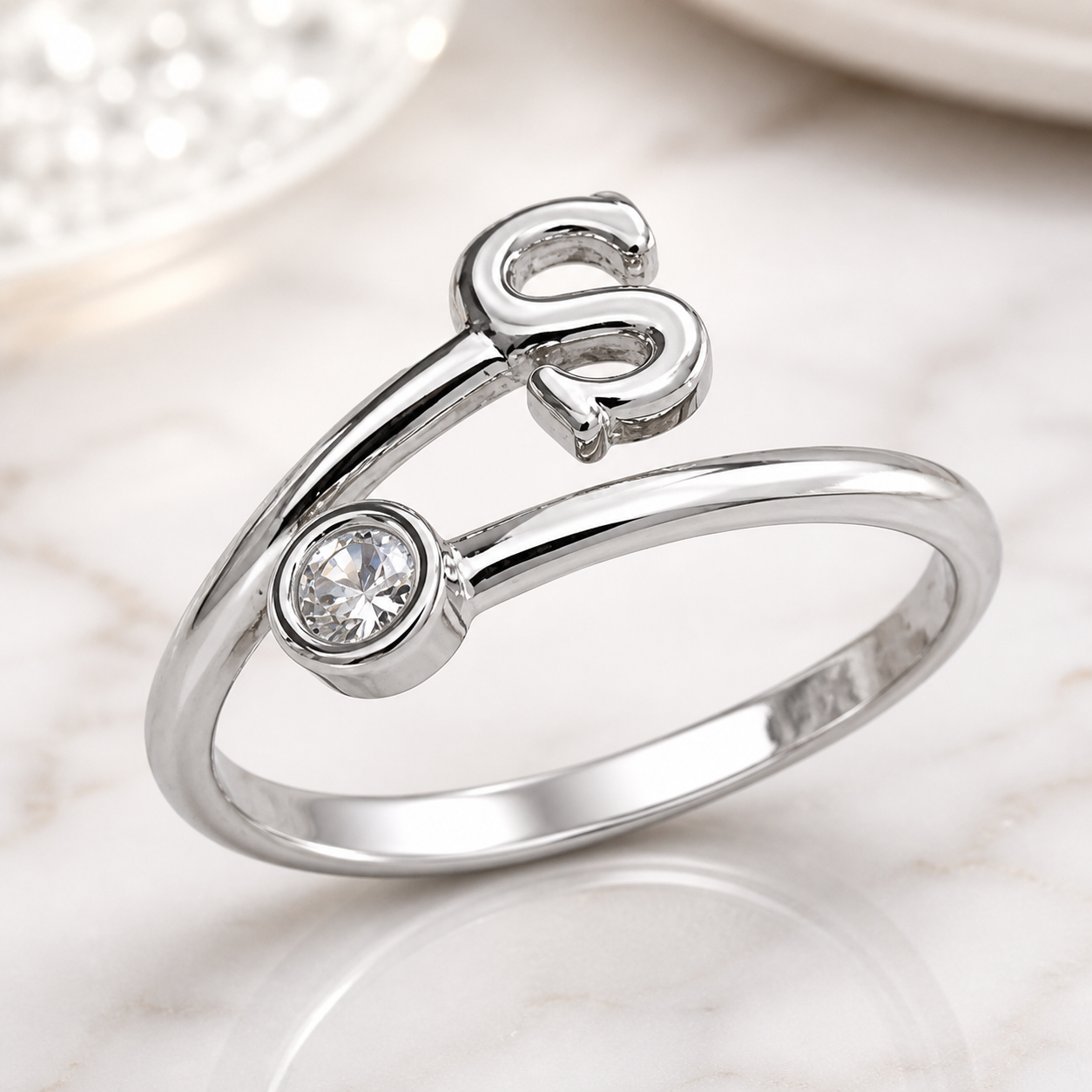 Elegant silver plated Alphabet S initial ring with sparkling cubic zirconia stone, minimalist designer finger ring for women and girls, perfect for daily wear, gifting, parties, weddings, and special occasions.